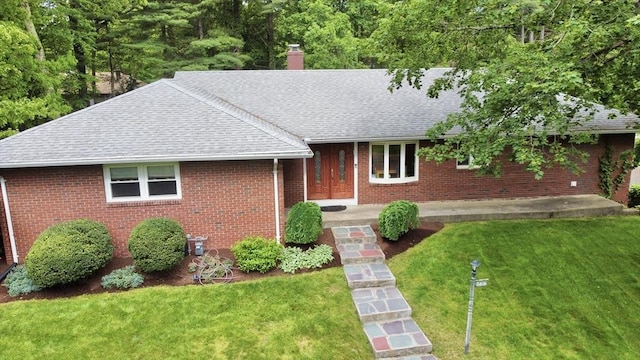 166 Primrose Dr, Longmeadow, MA 01106 - ranch-style home featuring roof with shingles, a front yard, brick siding, and a chimney