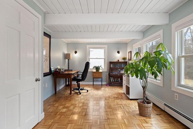 home office featuring a baseboard radiator, a healthy amount of sunlight, baseboards, and beam ceiling