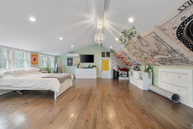 bedroom with a notable chandelier, vaulted ceiling, a wall mounted air conditioner, recessed lighting, and wood finished floors