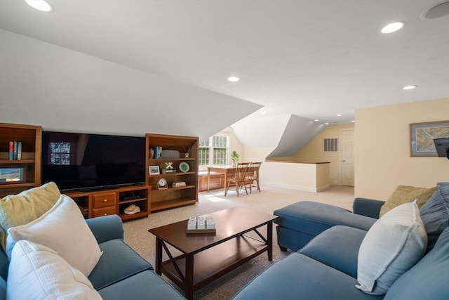 living area with lofted ceiling, light colored carpet, and recessed lighting