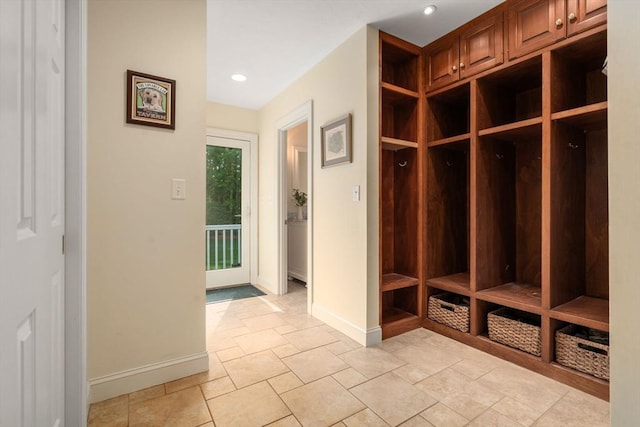 mudroom featuring baseboards and recessed lighting