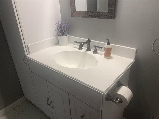 bathroom featuring vanity and tile patterned flooring