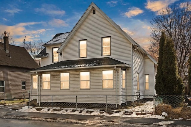 view of property exterior at dusk