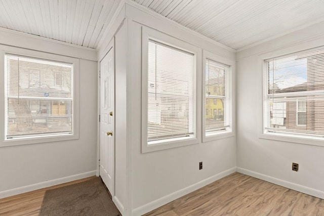 doorway to outside with light hardwood / wood-style flooring