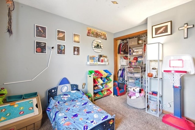 carpeted bedroom with a closet