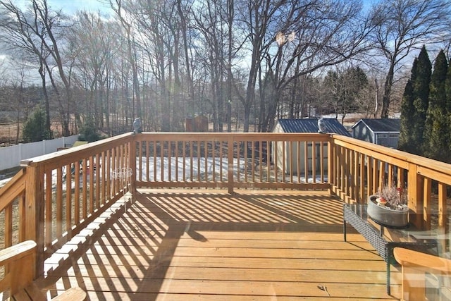 wooden deck featuring fence