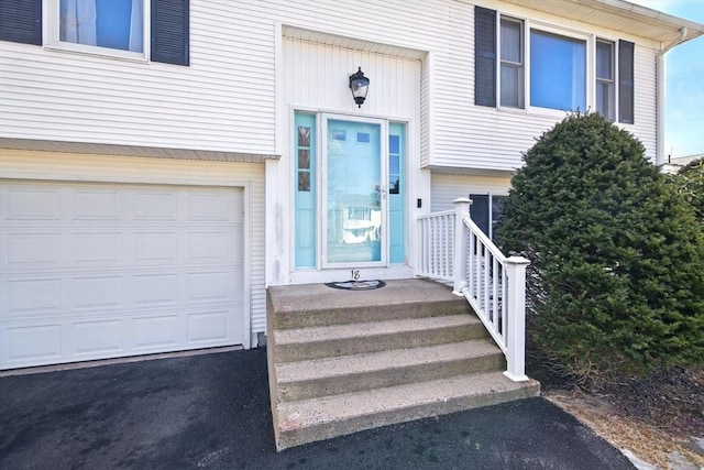 entrance to property with a garage