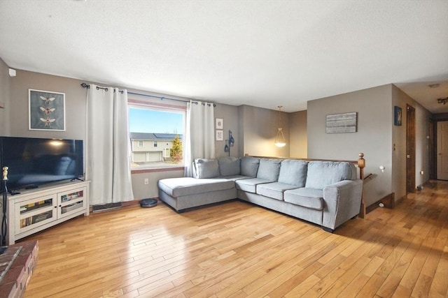 living area with light wood-style flooring