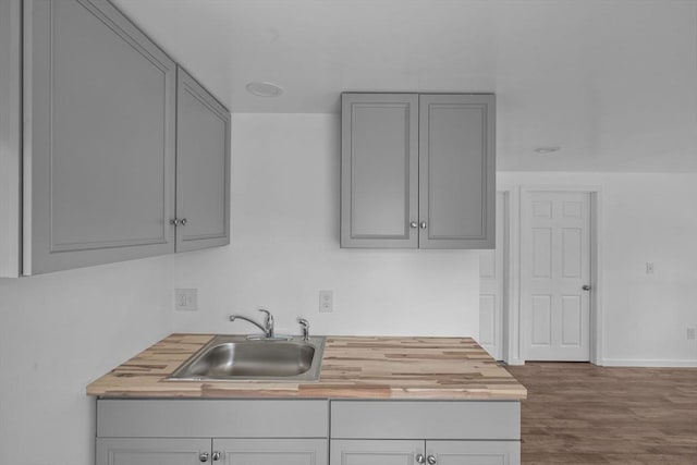 14 2nd, Lakeville, MA 02347 - kitchen with a sink, gray cabinetry, wooden counters, and wood finished floors