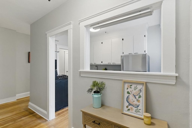 72 Strathmore Rd Unit 10B, Boston, MA 02135 - hall with light wood-type flooring and baseboards