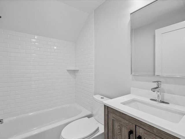 bathroom with toilet, shower / bath combination, lofted ceiling, and vanity