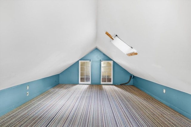 100 Center St, Dennis, MA 02660 - additional living space featuring vaulted ceiling and carpet flooring