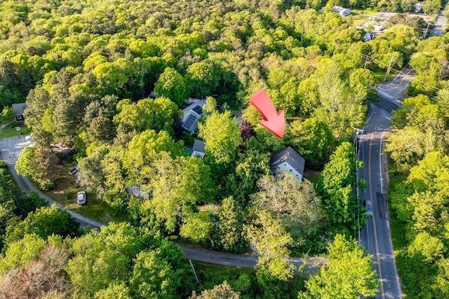 100 Center St, Dennis, MA 02660 - aerial view of property and surrounding area featuring a heavily wooded area