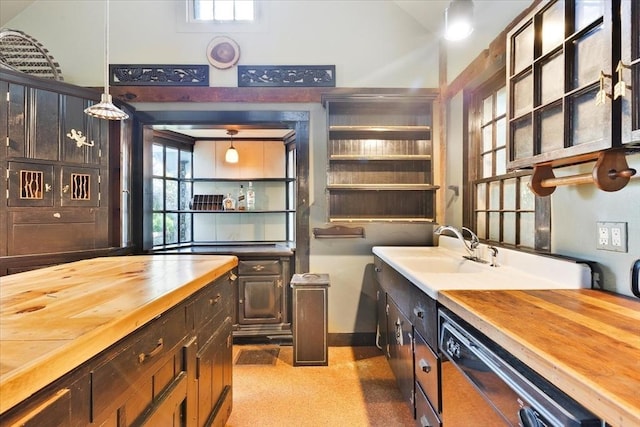 100 Center St, Dennis, MA 02660 - bar featuring dishwashing machine, a sink, hanging light fixtures, and baseboards