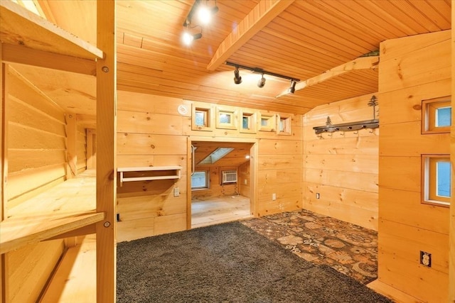 100 Center St, Dennis, MA 02660 - additional living space featuring wooden walls, carpet floors, and wooden ceiling