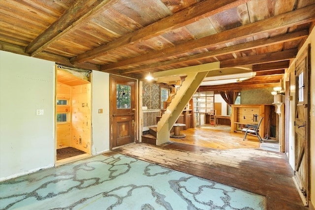 100 Center St, Dennis, MA 02660 - foyer featuring wooden ceiling with exposed beams, stairs, and wood finished floors