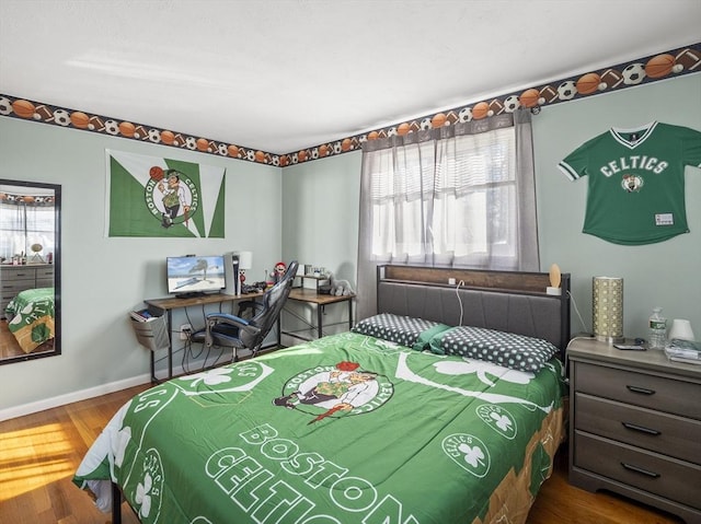 bedroom featuring wood-type flooring