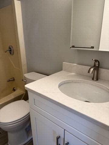 305 Pine St Unit 18, Lowell, MA 01851 - bathroom with vanity, toilet, and shower / washtub combination