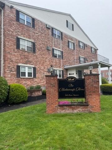 305 Pine St Unit 18, Lowell, MA 01851 - community / neighborhood sign featuring a yard