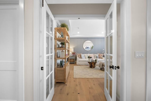 interior space featuring recessed lighting, french doors, and light wood-style floors