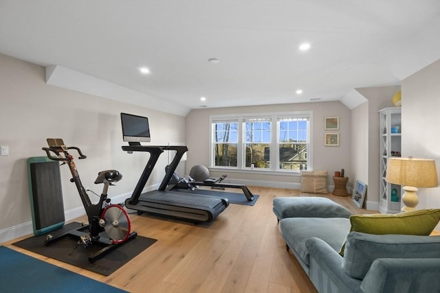 workout area with recessed lighting, baseboards, and wood-type flooring