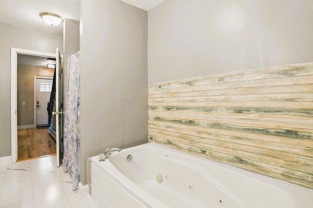 130 Franklin St, Milford, NH 03055 - full bath featuring a tub with jets, baseboards, and curtained shower