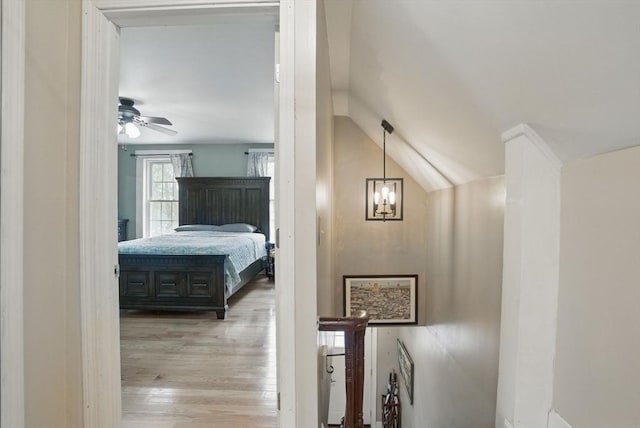 130 Franklin St, Milford, NH 03055 - hall featuring vaulted ceiling, wood finished floors, and a chandelier