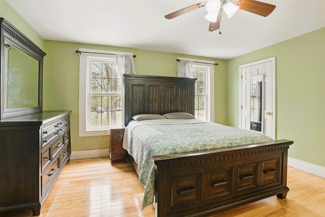 130 Franklin St, Milford, NH 03055 - bedroom with light wood-style flooring, baseboards, and a ceiling fan