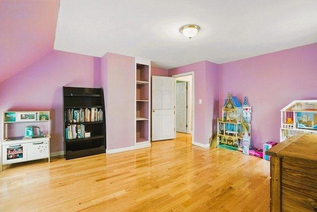 130 Franklin St, Milford, NH 03055 - playroom featuring wood finished floors and baseboards