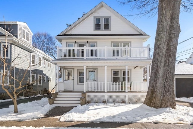 view of front of home featuring a porch and a balcony