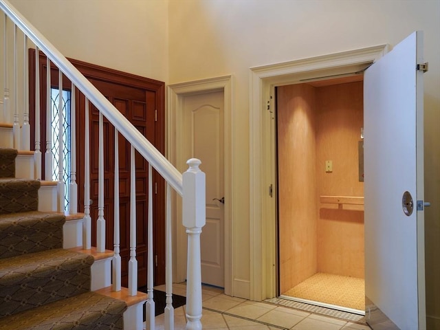 view of tiled foyer entrance