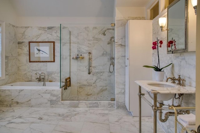 bathroom with sink and independent shower and bath