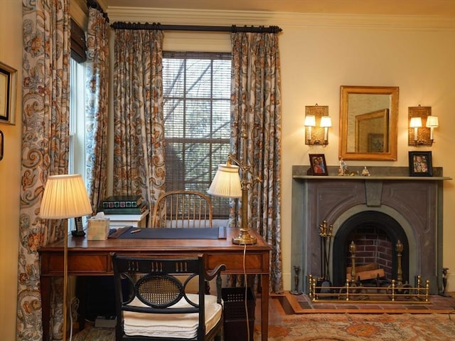 sitting room featuring ornamental molding