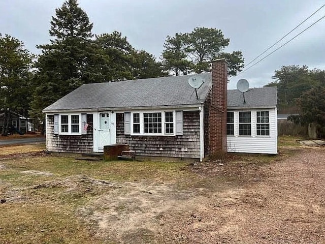 6 Elliot Dr, Dennis, MA 02670 - view of front of property featuring a chimney