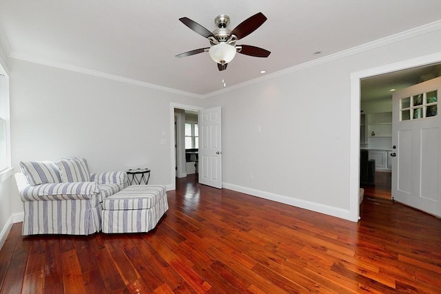 11 Winchester Ave, Bourne, MA 02532 - living area featuring ceiling fan, crown molding, hardwood / wood-style floors, and baseboards