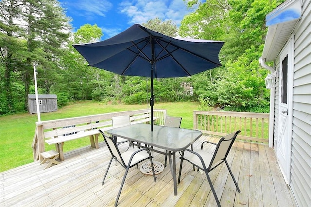 11 Winchester Ave, Bourne, MA 02532 - wooden terrace featuring outdoor dining space and a yard