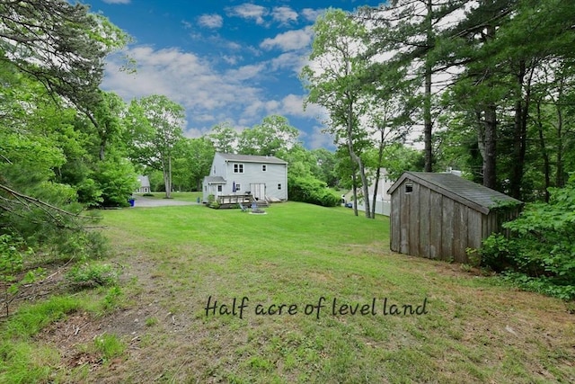 11 Winchester Ave, Bourne, MA 02532 - view of green lawn featuring view of wooded area