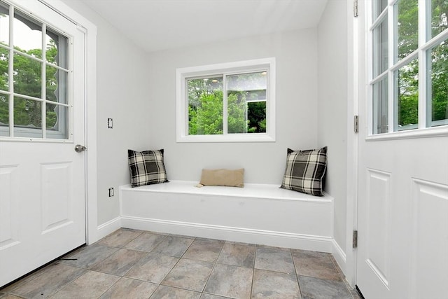 11 Winchester Ave, Bourne, MA 02532 - entryway featuring baseboards and light stone finish floors
