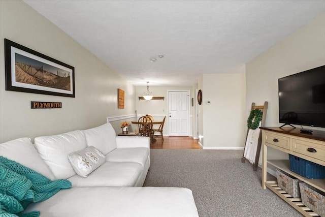 103 Grove St Unit 341, Rockland, MA 02370 - living room featuring carpet and baseboards