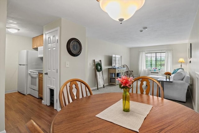 103 Grove St Unit 341, Rockland, MA 02370 - dining room with baseboards and light wood-style flooring