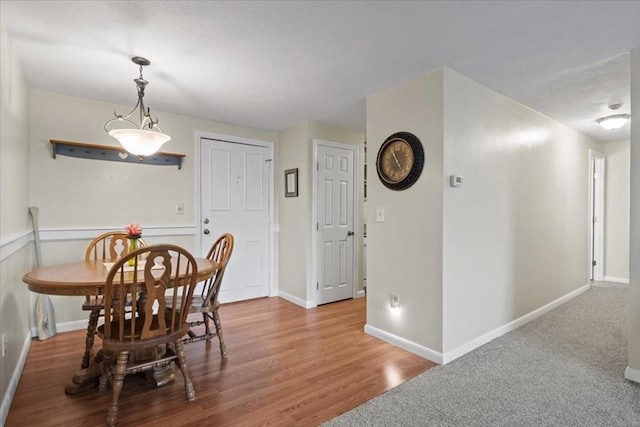 103 Grove St Unit 341, Rockland, MA 02370 - dining room featuring baseboards and wood finished floors