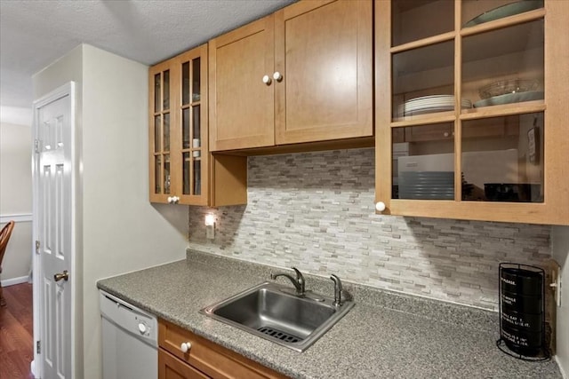 103 Grove St Unit 341, Rockland, MA 02370 - kitchen featuring white dishwasher, decorative backsplash, glass insert cabinets, and wood finished floors