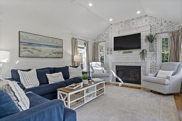 21 Grove St, Fairhaven, MA 02719 - living room featuring lofted ceiling, wood finished floors, a high end fireplace, and recessed lighting