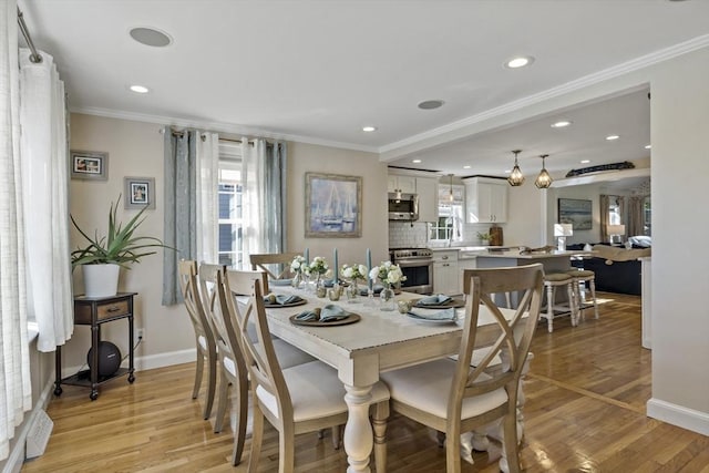 21 Grove St, Fairhaven, MA 02719 - dining space featuring plenty of natural light, recessed lighting, baseboards, crown molding, and light wood-style flooring