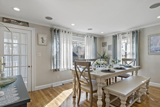21 Grove St, Fairhaven, MA 02719 - dining area with crown molding, baseboards, light wood-style flooring, and recessed lighting