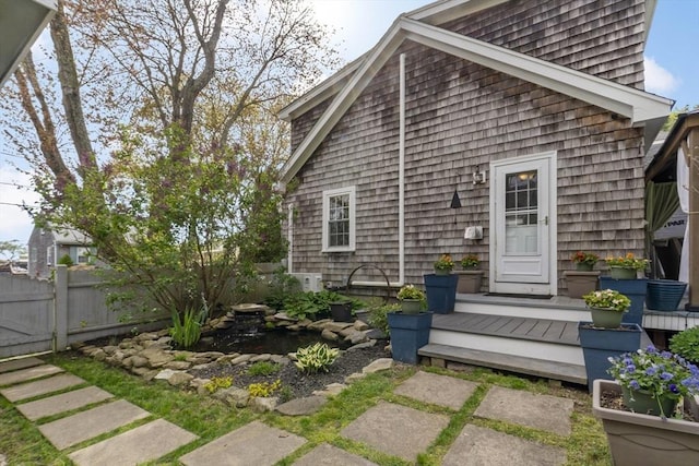 21 Grove St, Fairhaven, MA 02719 - back of house featuring fence