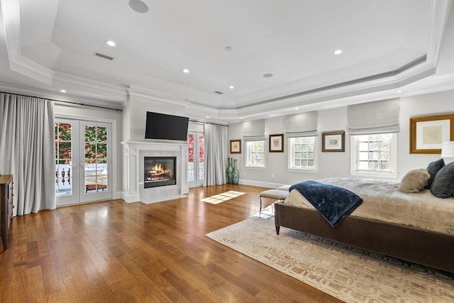 37 Radcliffe Rd, Newton, MA 02468 - bedroom featuring crown molding, access to exterior, wood finished floors, and a raised ceiling