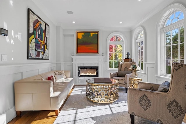 37 Radcliffe Rd, Newton, MA 02468 - living room with plenty of natural light, ornamental molding, wainscoting, and a decorative wall