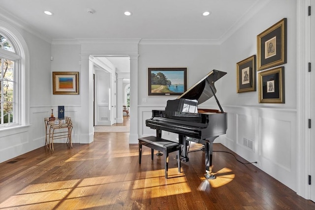 37 Radcliffe Rd, Newton, MA 02468 - sitting room featuring recessed lighting, a decorative wall, ornate columns, and wood finished floors