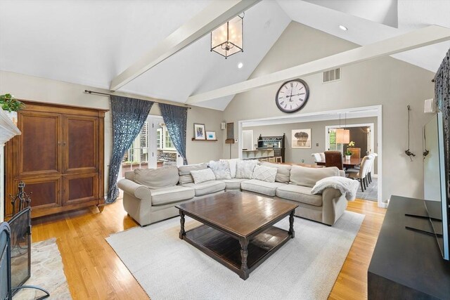 126 Arrow Head Rd, Marshfield, MA 02050 - living room featuring high vaulted ceiling, light wood-style floors, beamed ceiling, and recessed lighting